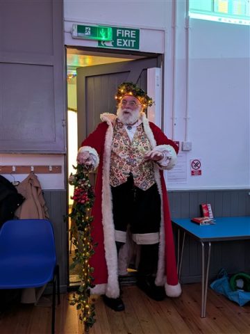 Santa stood in the doorway